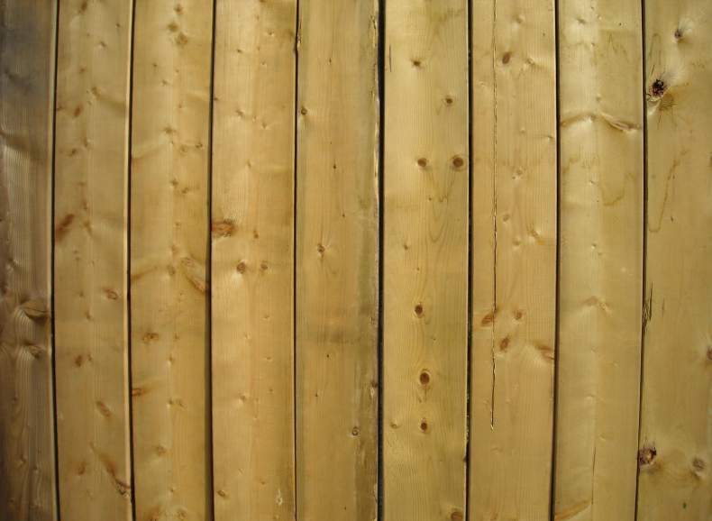 this image shows wood fence in Fullerton, California