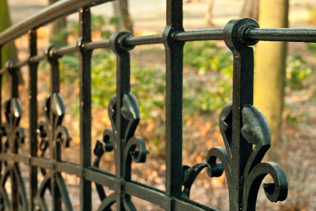 this image shows wrought iron fence in Fullerton, California